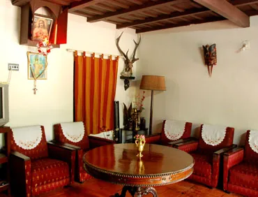 Heritage Living Room with Timber Ceilings and Clay Tile Floor